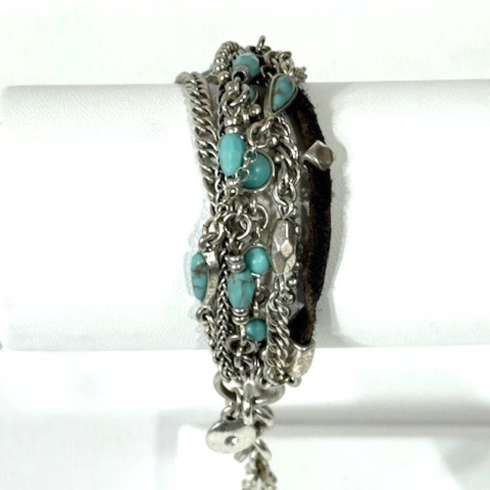 Alpaca silver and turquoise multi-strand bracelet with lobster clasp.